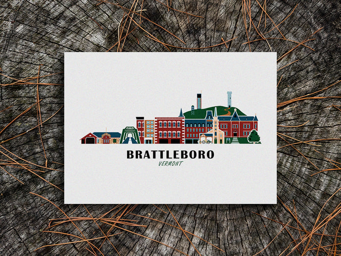 Art print of buildings arranged in a skyline with the text Brattleboro Vermont