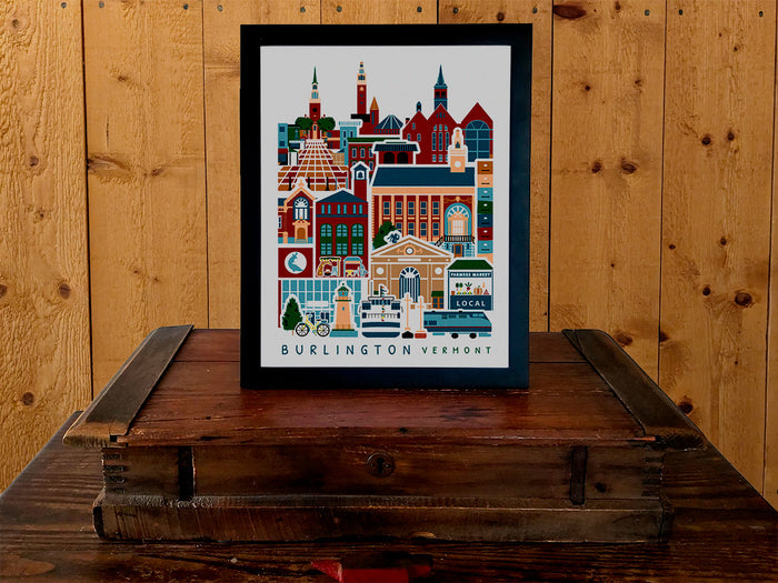 Framed vertical poster with buildings and landmarks in a stacked arrangement with the text Burlington Vermont