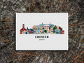 Art print of buildings arranged in a skyline with the text Chester Vermont