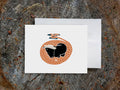 Greeting card with image of a dog with a sailor hat surrounded by rope