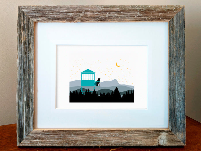 Framed illustration of a dog in a fire tower overlooking the mountains.