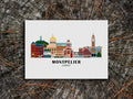 Art print of buildings arranged in a skyline with the text Montpelier Vermont
