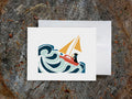 Greeting card with image of a dog in a sailboat